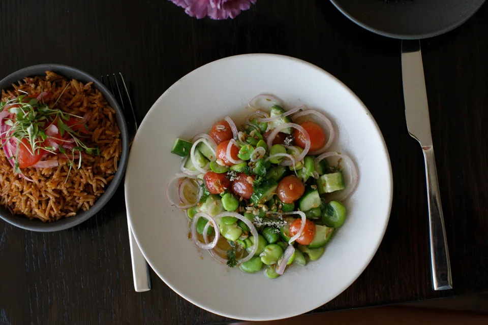 Salatet Ful with fava beans, vegetables and fresh herbs
