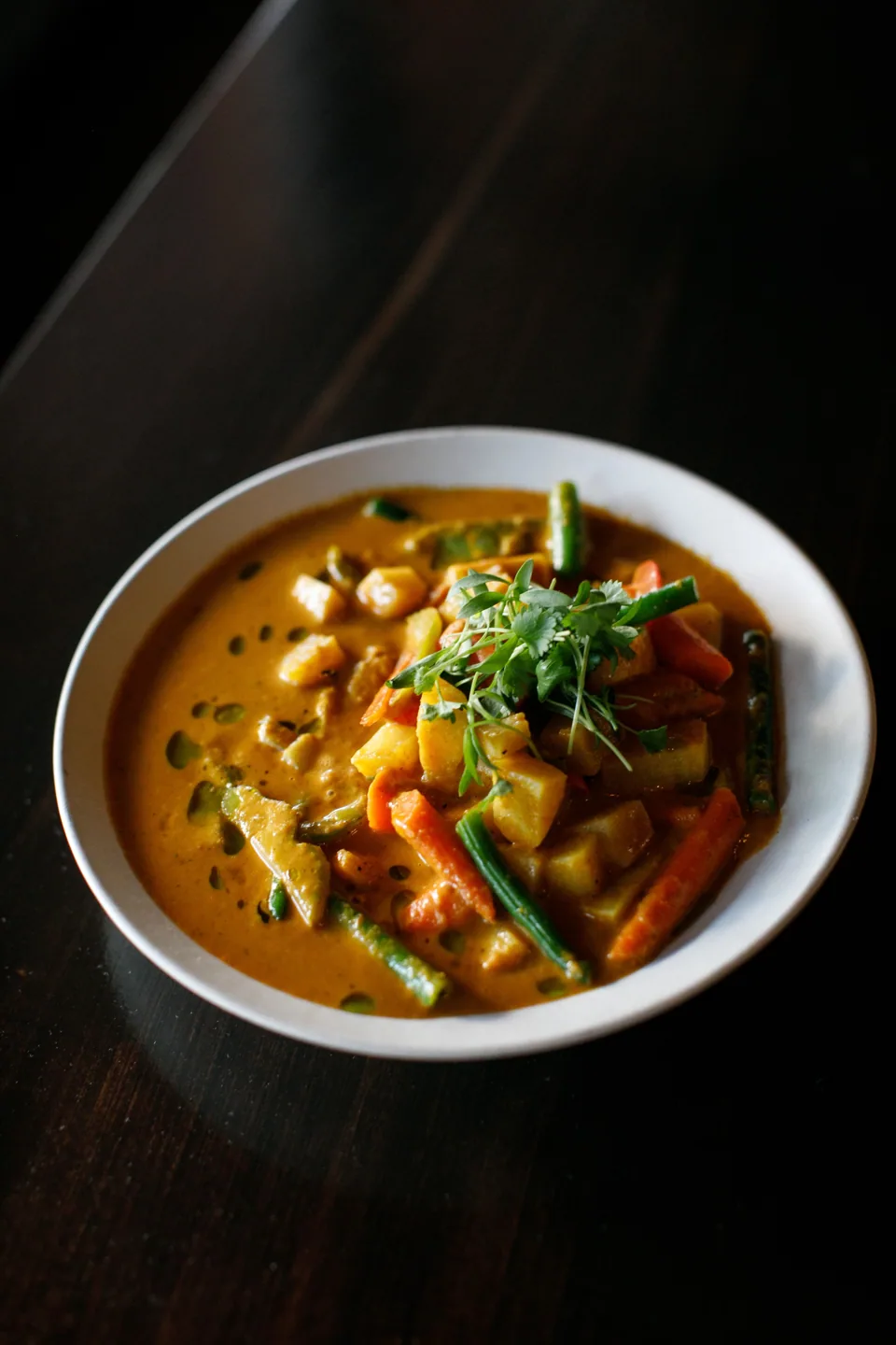 Vegetable coconut curry with fresh herbs